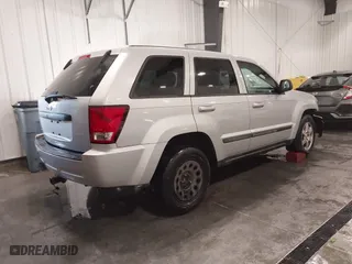 2008 Jeep Grand Cherokee Laredo with VIN 1J8GR48K88C108967, listed as a IAAI auction lot 41306142 with 190,786 mi miles. Bid and sale history available at carsss.com. Image 4.