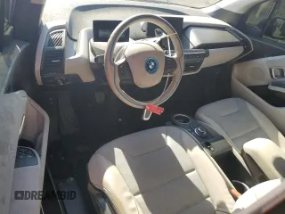 2016 BMW i3 z VIN WBY1Z2C53GV556473, wystawiony jako Copart lot #60911554 z przebiegiem 49 803 mil mil oraz Szkody całkowita. Historia ofert i sprzedaży dostępna na DreamBid. Obrazek 8.