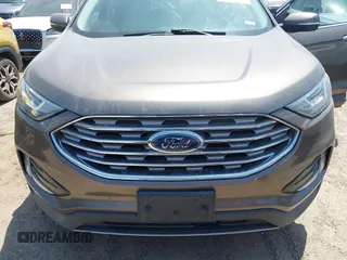 2019 Ford Edge Titanium z VIN 2FMPK3K91KBB48872, wystawiony jako IAAI lot #42020383 z przebiegiem 79 612 mil mil oraz . Historia ofert i sprzedaży dostępna na DreamBid. Obrazek 6.