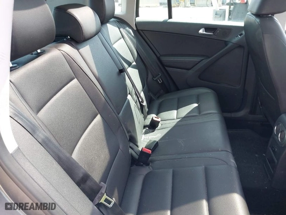 2012 Volkswagen Tiguan SE w/Sunroof & Nav with VIN WVGBV7AX4CW000207, listed as a IAAI auction lot 41889815 with 138,669 mi miles. Bid and sale history available at carsss.com. Image 8.