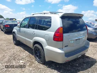 2004 Lexus GX 470 with VIN JTJBT20X640035217, listed as a IAAI auction lot 42156303 with 310,711 mi miles and . Bid and sale history available at DreamBid. Image 3.