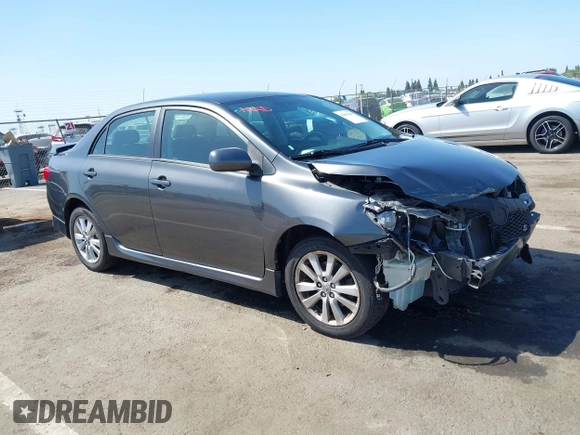 2009 Toyota Corolla with VIN 1NXBU40E69Z034459, listed as a IAAI auction lot 42095649 with 173,296 mi miles. Bid and sale history available at carsss.com. Image 1.