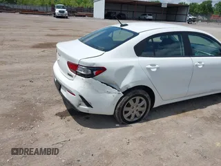 2023 Kia Rio S z VIN 3KPA24ADXPE613557, wystawiony jako IAAI lot #42198794 z przebiegiem 25 275 mil mil oraz . Historia ofert i sprzedaży dostępna na DreamBid. Obrazek 6.