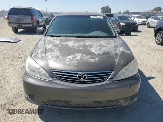 2005 Toyota Camry STD with VIN JTDBE32KX53029392, listed as a Copart auction lot 65439115 with 77,464 mi miles and Salvage title. Bid and sale history available at DreamBid. Image 5.