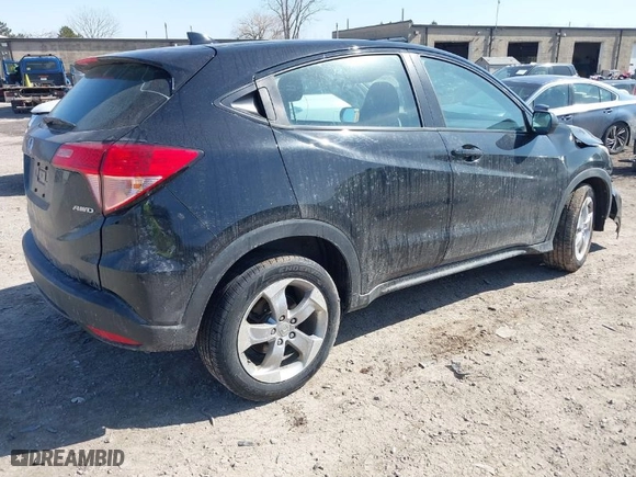 2018 Honda HR-V LX with VIN 3CZRU6H31JM731249, listed as a IAAI auction lot 41801350 with 63,868 mi miles. Bid and sale history available at carsss.com. Image 4.