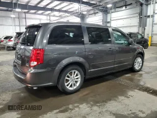 2015 Dodge Grand Caravan SXT with VIN 2C4RDGCG5FR622086, listed as a Copart auction lot 51769155 with 217,538 mi miles and Salvage Title. Bid and sale history available at DreamBid. Image 3.