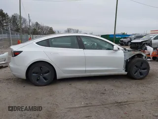 2020 Tesla Model 3 Standard Range Plus with VIN 5YJ3E1EA1LF799766, listed as a IAAI auction lot 41386508 with 90,000 mi miles. Bid and sale history available at carsss.com. Image 14.