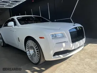 2015 Rolls-Royce Wraith with VIN SCA665C52FUX85482, listed as a Copart auction lot 77887554 with 99,781 mi miles and Salvage Title. Bid and sale history available at carsss.com. Image 1.