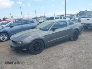 2011 Ford Mustang V6 with VIN 1ZVBP8AM7B5122930, listed as a IAAI auction lot 42050572 with 164,568 mi miles and . Bid and sale history available at DreamBid. Image 2.