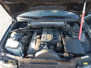 2004 BMW 3 Series 325Ci with VIN WBABW33414PL34071, listed as a IAAI auction lot 41594181 with 207,483 mi miles. Bid and sale history available at carsss.com. Image 10.