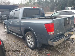 2010 Nissan Titan SE with VIN 1N6BA0ED1AN304375, listed as a IAAI auction lot 41384892 with 241,626 mi miles. Bid and sale history available at carsss.com. Image 3.