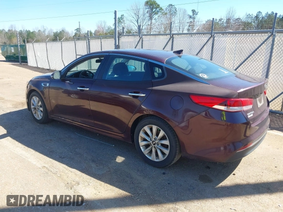 2017 Kia Optima LX with VIN 5XXGT4L33HG163285, listed as a IAAI auction lot 41802193 with 122,159 mi miles. Bid and sale history available at carsss.com. Image 3.
