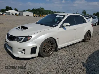 2012 Subaru WRX WRX STI with VIN JF1GV8J68CL013976, listed as a Copart auction lot 66170215 with 105,410 mi miles and Clean title. Bid and sale history available at DreamBid. Image 1.