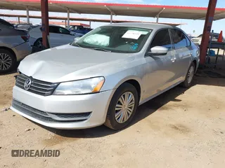 2015 Volkswagen Passat 1.8T Wolfsburg Ed with VIN 1VWAT7A31FC028990, listed as a IAAI auction lot 41778229 with 73,553 mi miles. Bid and sale history available at carsss.com. Image 17.