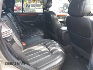1999 Jeep Grand Cherokee Limited with VIN 1J4GW68N9XC808639, listed as a IAAI auction lot 42521785 with 156,864 mi miles and . Bid and sale history available at DreamBid. Image 8.