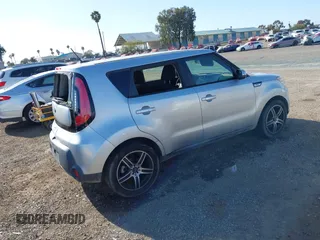2014 Kia Soul + with VIN KNDJP3A51E7729246, listed as a IAAI auction lot 41976085 with 83,319 mi miles. Bid and sale history available at carsss.com. Image 4.