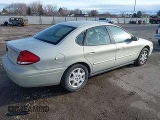2006 Ford Taurus SE with VIN 1FAFP53U36A195487, listed as a IAAI auction lot 41828457 with 109,703 mi miles. Bid and sale history available at carsss.com. Image 4.