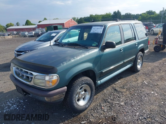 1996 Ford Explorer XL with VIN 1FMDU34X3TUC22832, listed as a IAAI auction lot 42738515 with 165,408 mi miles and . Bid and sale history available at DreamBid. Image 2.