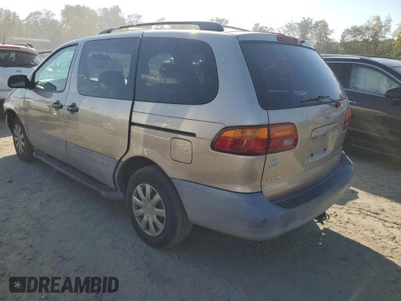 2000 Toyota Sienna LE with VIN 4T3ZF13C4YU304036, listed as a Copart auction lot 72448274 with 176,388 mi miles and Salvage Title. Bid and sale history available at carsss.com. Image 2.