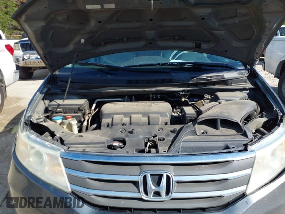 2011 Honda Odyssey EX-L with VIN 5FNRL5H6XBB073482, listed as a IAAI auction lot 42090463 with 213,061 mi miles and . Bid and sale history available at carsss.com. Image 10.