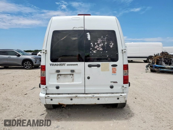 2013 Ford Transit Connect XLT z VIN NM0LS7DN2DT167919, wystawiony jako Copart lot #62305175 z przebiegiem 242 563 mil mil oraz Szkoda całkowita • Salvage title. Historia ofert i sprzedaży dostępna na DreamBid. Obrazek 6.