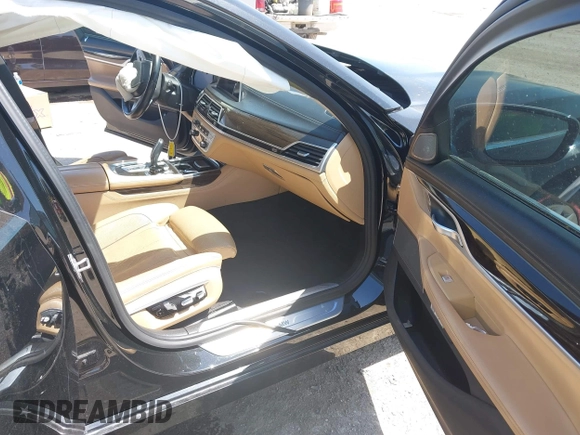 2017 BMW 7 Series 740i xDrive with VIN WBA7E4C50HGU99106, listed as a IAAI auction lot 41997603 with 138,322 mi miles. Bid and sale history available at carsss.com. Image 5.