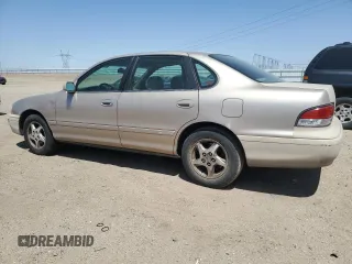 1997 Toyota Avalon XL with VIN 4T1BF12B0VU187179, listed as a Copart auction lot 54708565 with 336,922 mi miles and Salvage Title. Bid and sale history available at DreamBid. Image 2.