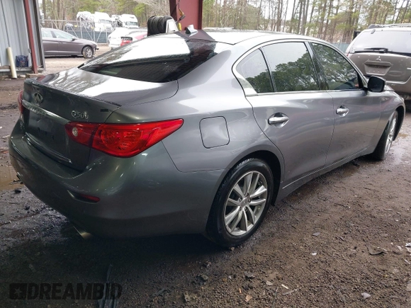 2015 Infiniti Q50 Premium z VIN JN1BV7ARXFM411040, wystawiony jako IAAI lot #41706295 z przebiegiem 97 297 mil mil oraz . Historia ofert i sprzedaży dostępna na DreamBid. Obrazek 4.