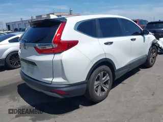 2019 Honda CR-V LX with VIN 2HKRW5H33KH407463, listed as a IAAI auction lot 42034584 with 85,454 mi miles and . Bid and sale history available at DreamBid. Image 4.