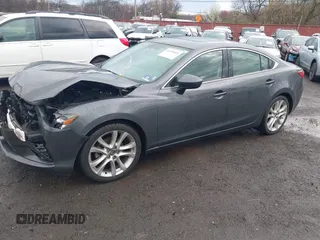 2014 Mazda Mazda6 i Touring with VIN JM1GJ1V6XE1138483, listed as a IAAI auction lot 41956426 with 91,294 mi miles. Bid and sale history available at carsss.com. Image 2.