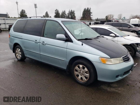 2004 Honda Odyssey EX with VIN 5FNRL18634B015984, listed as a Copart auction lot 48717675 with 137,905 mi miles and Salvage Title. Bid and sale history available at DreamBid. Image 4.