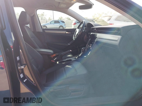 2020 Volkswagen Passat SE with VIN 1VWSA7A33LC009556, listed as a IAAI auction lot 40989431 with 96,540 mi miles and . Bid and sale history available at DreamBid. Image 5.