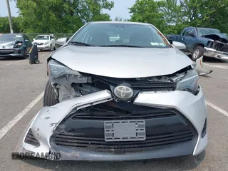 2018 Toyota Corolla L z VIN 2T1BURHE9JC067155, wystawiony jako IAAI lot #42492008 z przebiegiem 169 311 mil mil oraz . Historia ofert i sprzedaży dostępna na DreamBid. Obrazek 12.