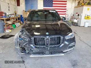 2021 BMW X5 xDrive40i with VIN 5UXCR6C01M9F08658, listed as a Copart auction lot 49910884 with 0 mi miles and Salvage Title. Bid and sale history available at carsss.com. Image 5.