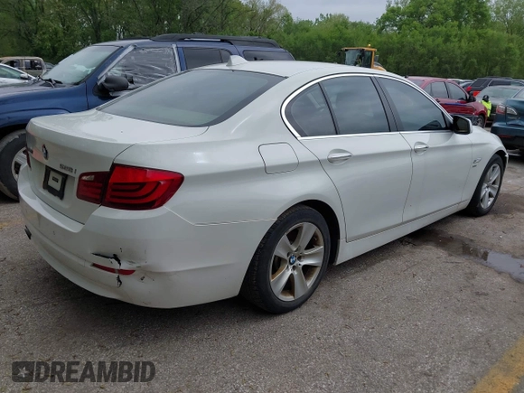 2012 BMW 5 Series 528i xDrive with VIN WBAXH5C58CDW11514, listed as a IAAI auction lot 42131076 with 146,788 mi miles. Bid and sale history available at carsss.com. Image 4.