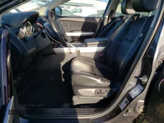 2015 Mazda CX-9 Grand Touring z VIN JM3TB3DV2F0456130, wystawiony jako Copart lot #60545095 z przebiegiem 120 892 mil mil oraz Szkoda całkowita • Salvage title. Historia ofert i sprzedaży dostępna na DreamBid. Obrazek 7.