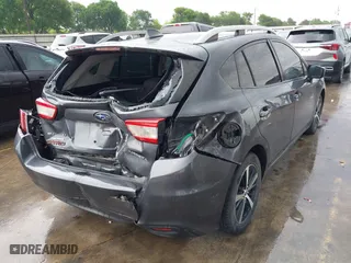 2019 Subaru Impreza Premium with VIN 4S3GTAD69K3725933, listed as a IAAI auction lot 41919500 with 102,556 mi miles. Bid and sale history available at carsss.com. Image 4.