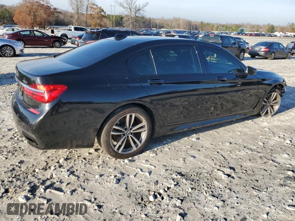 2016 BMW 7 Series 750i with VIN WBA7F0C5XGGL99048, listed as a Copart auction lot 84815364 with 96,743 mi miles and Salvage Title. Bid and sale history available at carsss.com. Image 3.