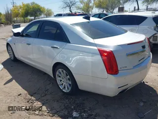 2015 Cadillac CTS with VIN 1G6AP5SX7F0139285, listed as a IAAI auction lot 41999355 with 34,709 mi miles and . Bid and sale history available at DreamBid. Image 3.