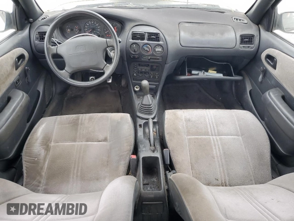 1997 Geo Prizm z VIN 1Y1SK526XVZ437486, wystawiony jako Copart lot #86422384 z przebiegiem 404 485 mil mil oraz Tytuł czysty. Historia ofert i sprzedaży dostępna na DreamBid. Obrazek 8.