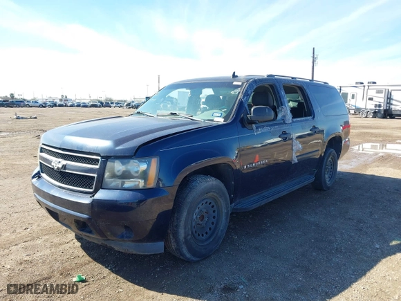 2009 Chevrolet Suburban LS with VIN 1GNFC16029R200974, listed as a IAAI auction lot 41370873 with 207,649 mi miles. Bid and sale history available at carsss.com. Image 2.