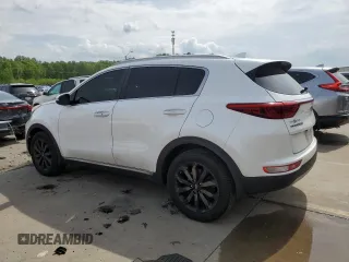 2019 Kia Sportage EX z VIN KNDPNCAC7K7522953, wystawiony jako Copart lot #54906835 z przebiegiem 128 011 mil mil oraz Szkoda całkowita • Salvage title. Historia ofert i sprzedaży dostępna na DreamBid. Obrazek 2.
