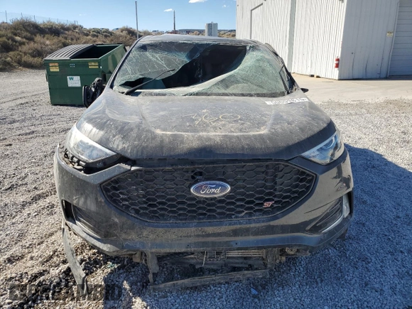 2021 Ford Edge ST z VIN 2FMPK4AP8MBA57400, wystawiony jako Copart lot #50099815 z przebiegiem Nie podano mil oraz Szkoda całkowita • Salvage title. Historia ofert i sprzedaży dostępna na DreamBid. Obrazek 5.