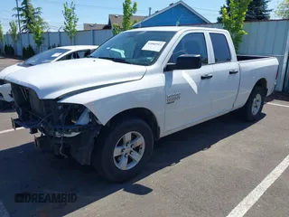 2024 Ram 1500 Classic SLT with VIN 1C6RR6GG4RS135980, listed as a IAAI auction lot 42086911 with 31,001 mi miles. Bid and sale history available at carsss.com. Image 2.