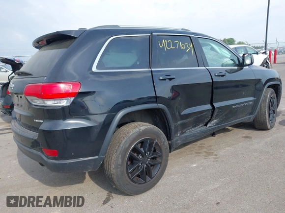 2018 Jeep Grand Cherokee Laredo with VIN 1C4RJFAG5JC487893, listed as a IAAI auction lot 42271034 with 91,346 mi miles and . Bid and sale history available at DreamBid. Image 4.