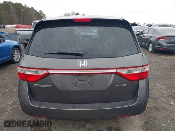 2012 Honda Odyssey Touring with VIN 5FNRL5H99CB071010, listed as a IAAI auction lot 41651233 with 186,913 mi miles. Bid and sale history available at carsss.com. Image 17.