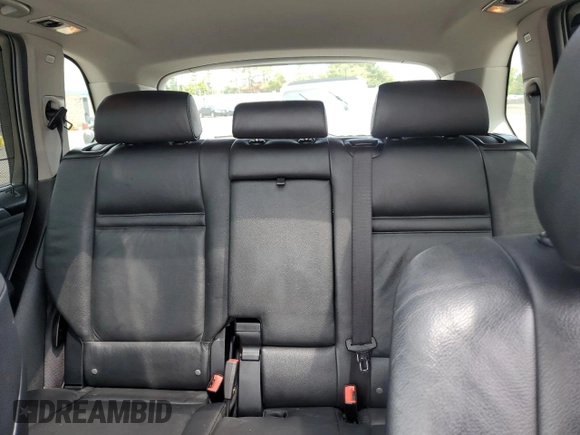 2012 BMW X5 35i with VIN 5UXZV4C54CL763857, listed as a Copart auction lot 57943195 with 143,522 mi miles and Salvage title. Bid and sale history available at DreamBid. Image 10.