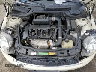 2009 MINI Hardtop S with VIN WMWMF73569TW84934, listed as a Copart auction lot 51344975 with 123,929 mi miles and Salvage title. Bid and sale history available at DreamBid. Image 11.