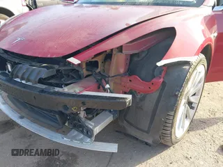 2018 Tesla Model 3 Long Range Battery with VIN 5YJ3E1EA8JF047298, listed as a IAAI auction lot 41403507 with 172,142 mi miles and . Bid and sale history available at DreamBid. Image 6.