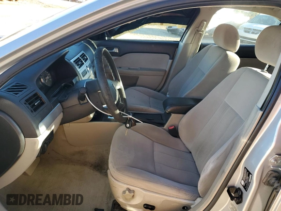 2006 Mercury Milan with VIN 3MEHM07126R655886, listed as a Copart auction lot 82015354 with 128,341 mi miles and Salvage title. Bid and sale history available at DreamBid. Image 7.